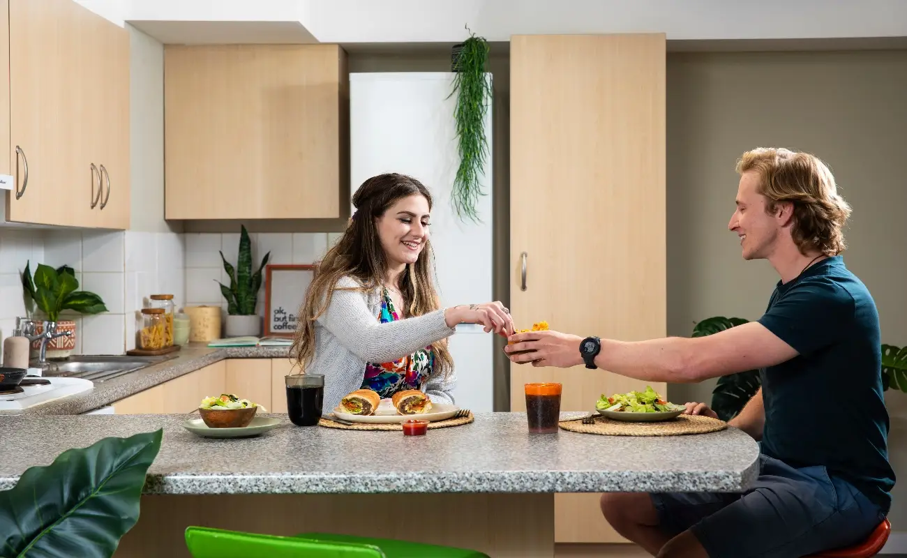 Students in a shared kitchen