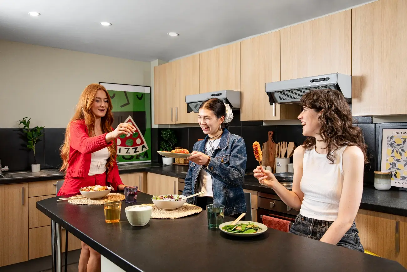 Students in a shared kitchen